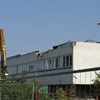 Łódź: Początek przebudowy zajezdni Limanowskiego. Znika budynek biurowy [ZDJĘCIA]
